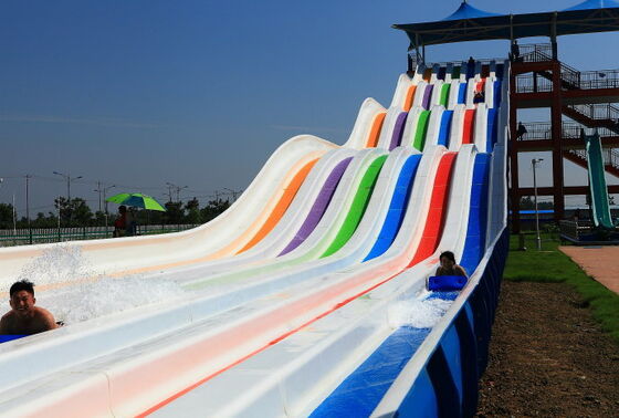Meerbaans regenboog waterglijbaan voor waterpark | 4-baans mattenrace glijbaan | Fiberglass regenboog glijbaan fabrikant sinds 1994